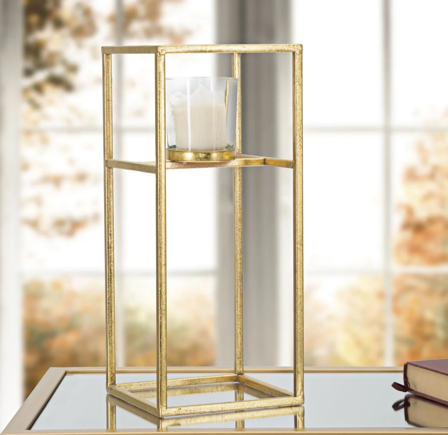 Bougeoir en métal doré et verre transparent carré