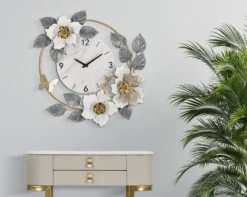 Horloge murale décorée fleurs et feuilles cadran marbre