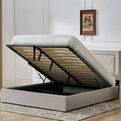 Lit coffre Sandiego avec sommier relevable 160x200cm et tête de lit cloutée Velours Taupe