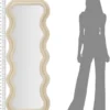 Miroir mural ondulé en bois et tissu crème