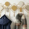 Pendentif mural en métal doré avec miroirs et surfaces marbrées