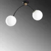 Plafonnier 2 lampes arcs asymétriques Gabilan Verre Blanc et Métal Noir et Or