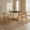 Table hexagonale 120cm Zadig Verre Effet marbre noir et pied Métal Or