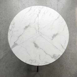 Table ronde pliante gain de place Foldine Ø80cm Métal Noir et Effet marbre Blanc