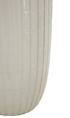 Vase en céramique blanche avec anneaux dorés