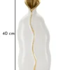 Vase sinueux en céramique blanche et détails dorés